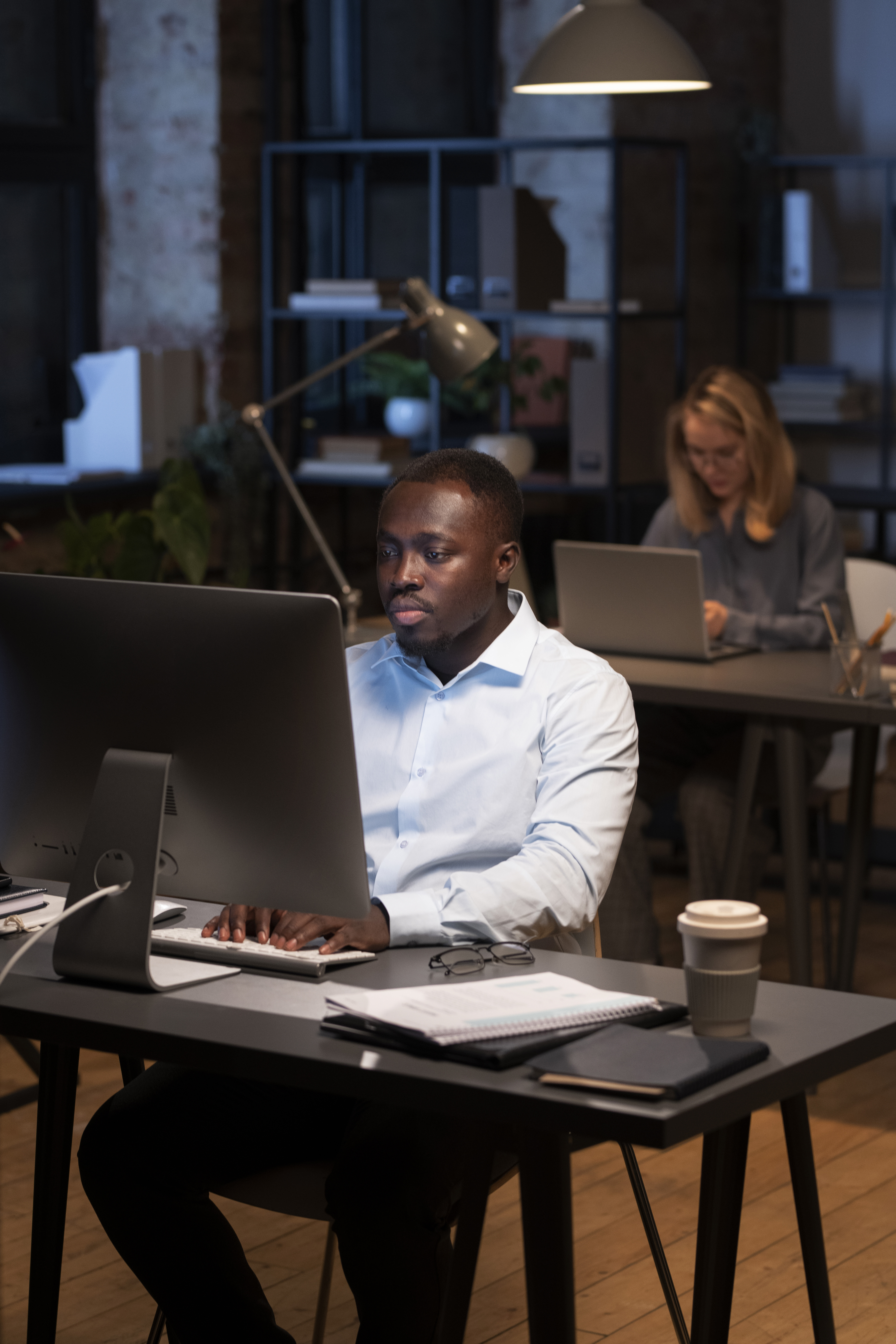 black man using computer